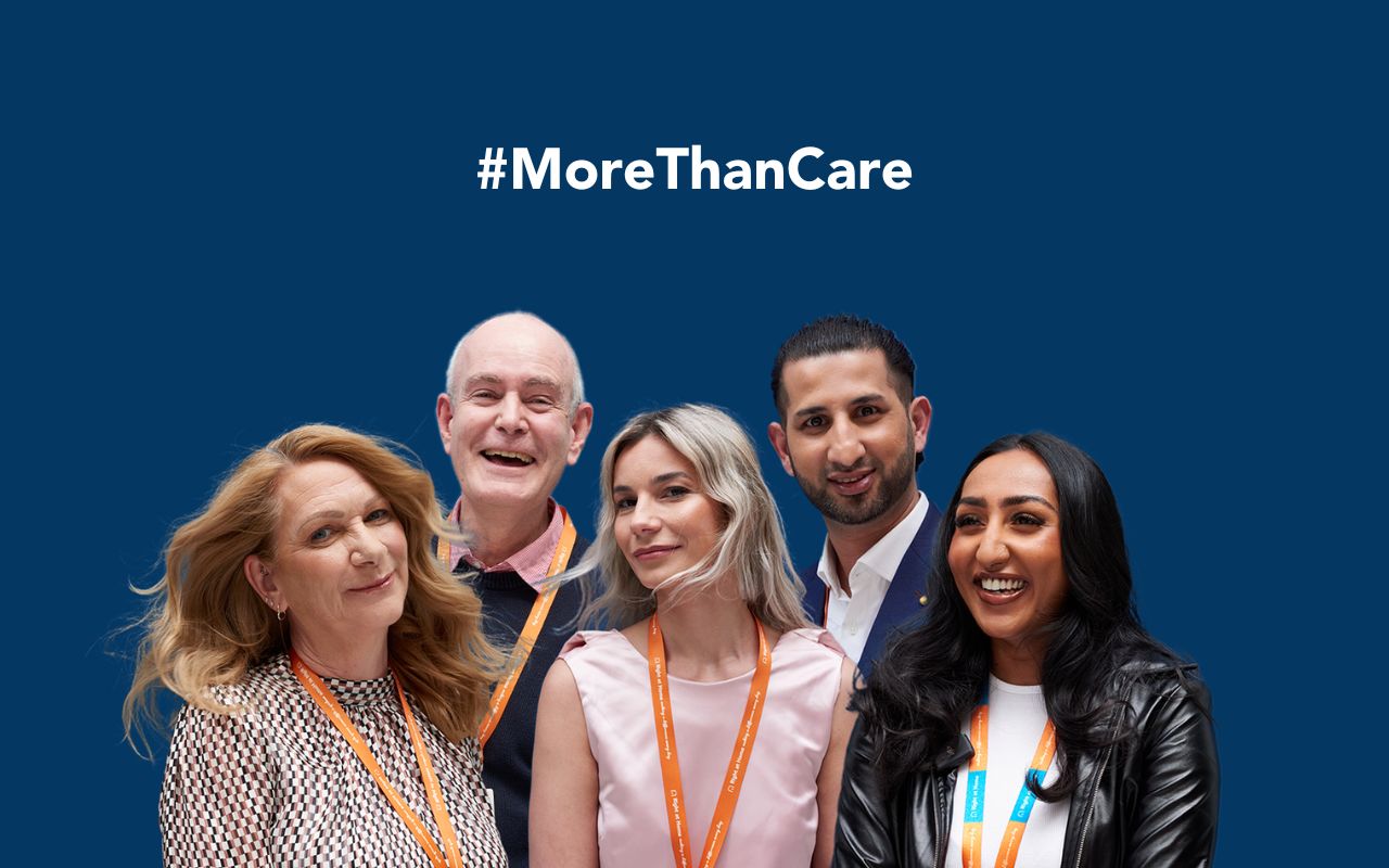 homecare caregivers standing in a group and promoting a recruitment campaign